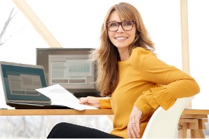 Woman sitting at computer